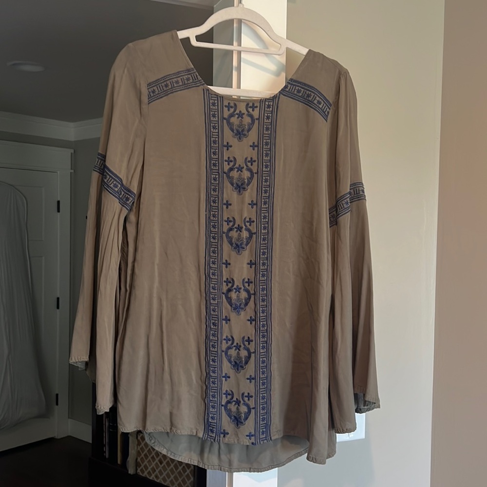 Olive green top with navy detailing